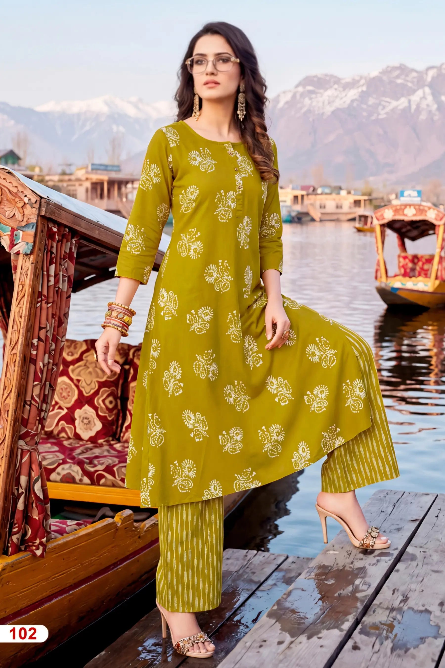 Mehandi Green Heavy Rayon Printed Kurta Set with Striped Pants