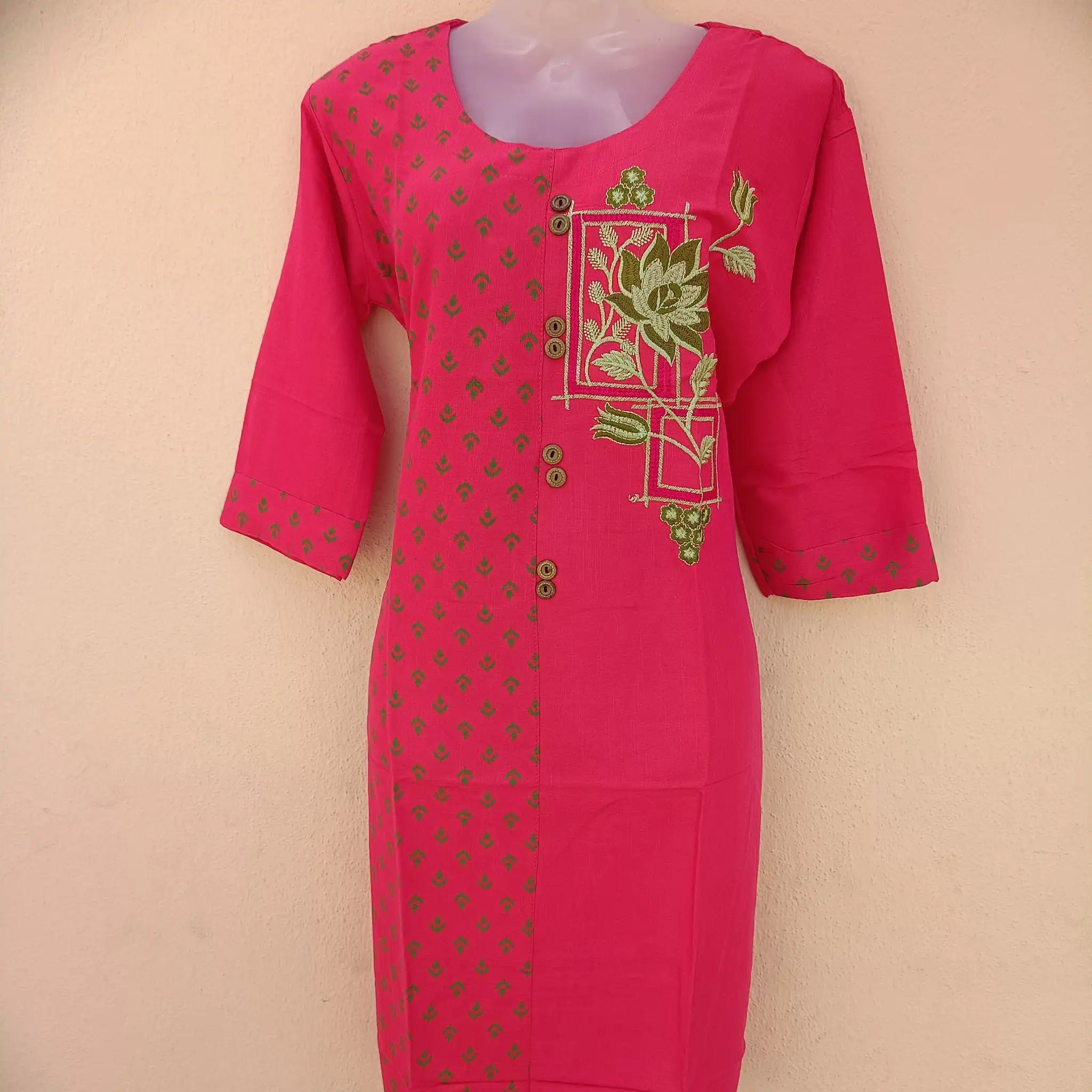 Lady dressed in regal maroon two-tone kurta with intricate embroidery for a sophisticated look