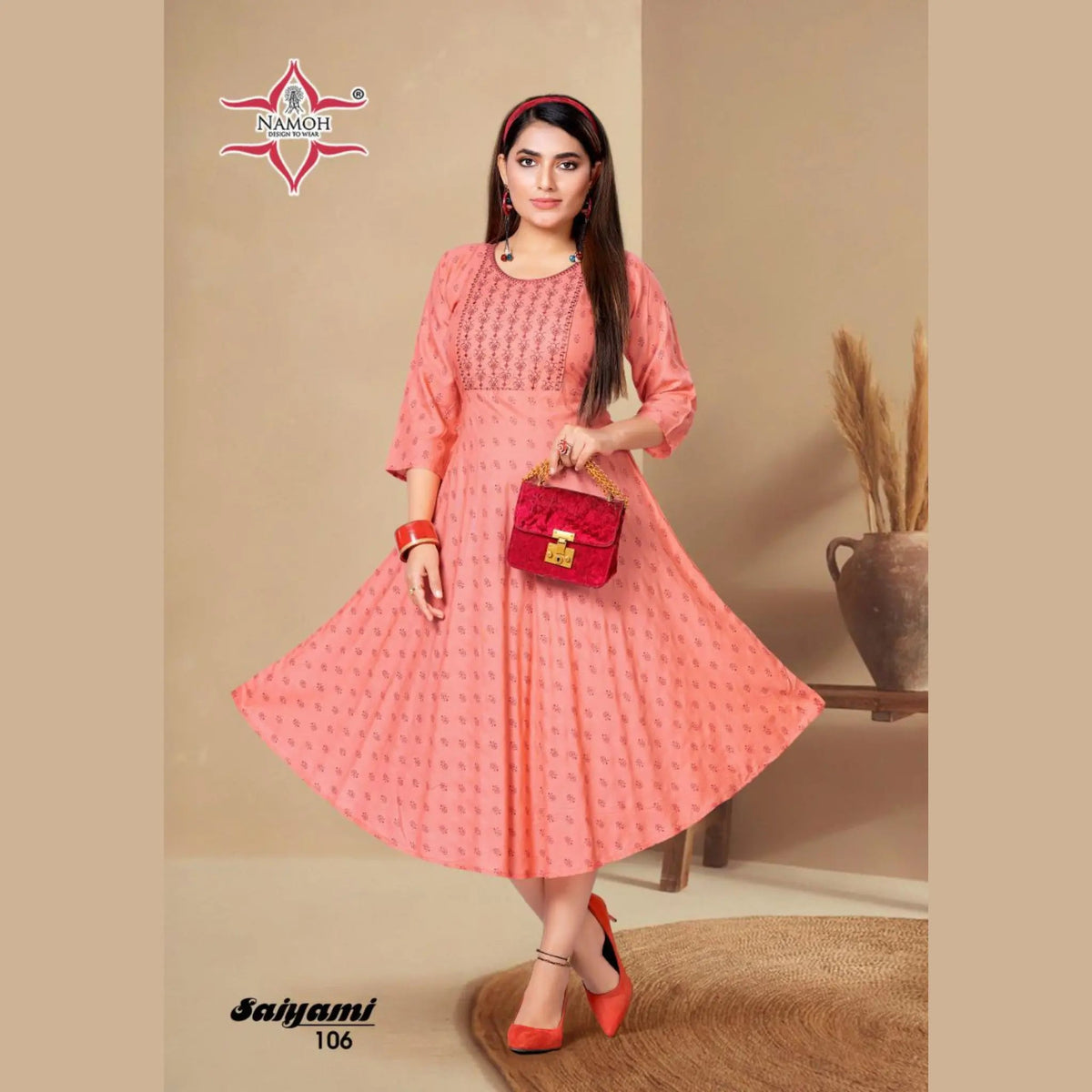Light Salmon Pink Fancy Rayon Print Kurti with Embroidery