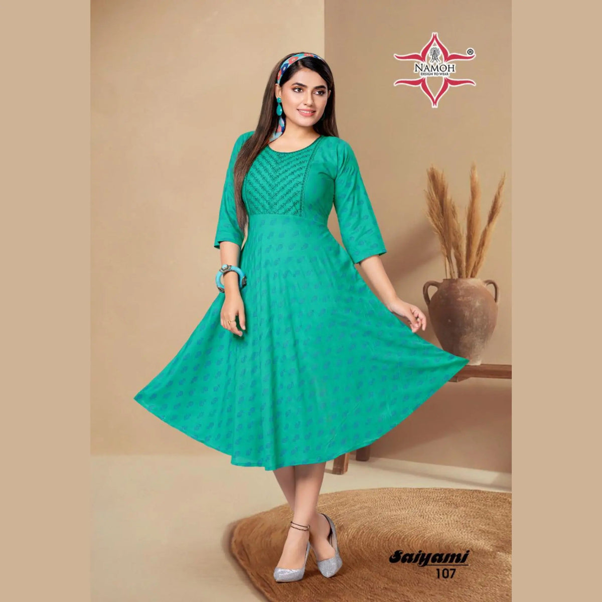 Medium Turquoise Fancy Rayon Print Kurti with Embroidery Main image